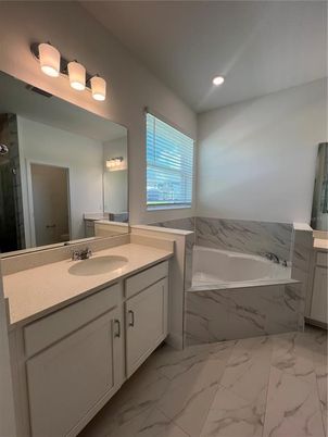 Bathroom, Dual Sink Vanities, Interior, Marble, Marble Walls, Recessed Lighting