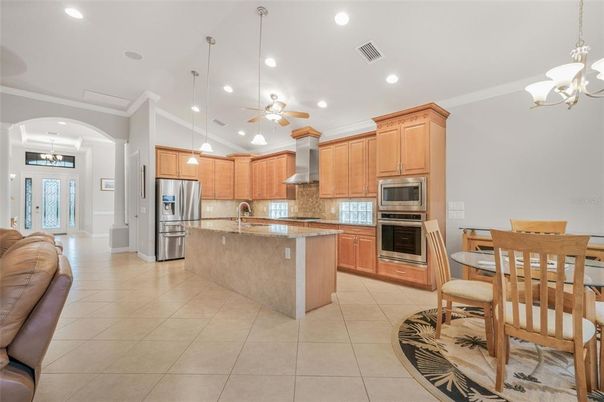 Chandelier, Dining room, Interior, Kitchen, Pendant Lights, Recessed Lighting, Stainless Steel Appliances