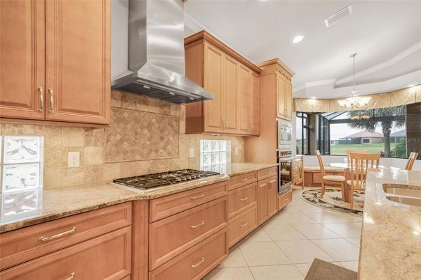 Chandelier, Dining room, Interior, Kitchen, Pendant Lights, Recessed Lighting, Stainless Steel Appliances