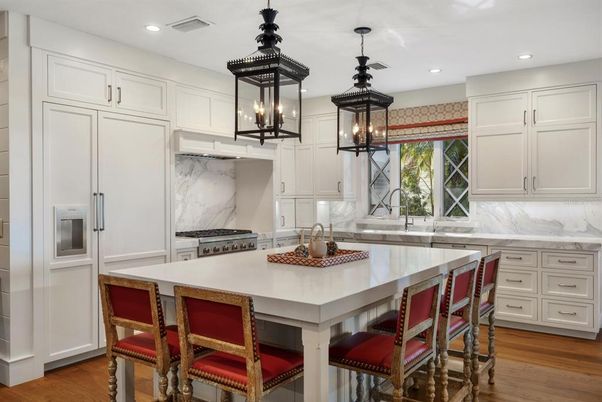 Interior, Kitchen, Marble Walls, Pendant Lights, Recessed Lighting, Stainless Steel Appliances, Wood Texture Flooring