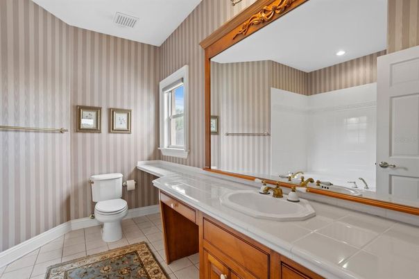 Bathroom, Dual Sink Vanities, Interior, Recessed Lighting, Tile Countertops