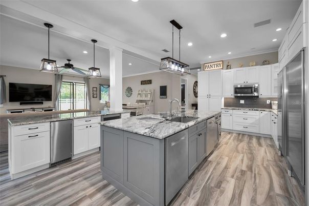 Interior, Kitchen, Pendant Lights, Recessed Lighting, Stainless Steel Appliances, Wood Texture Flooring