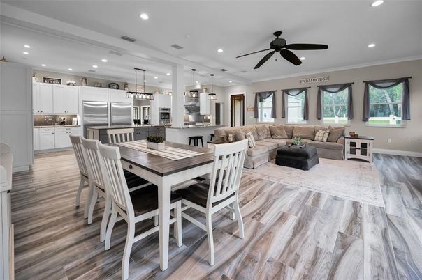 Dining room, Interior, Kitchen, Living room, Pendant Lights, Recessed Lighting, Stainless Steel Appliances, Wood Texture Flooring