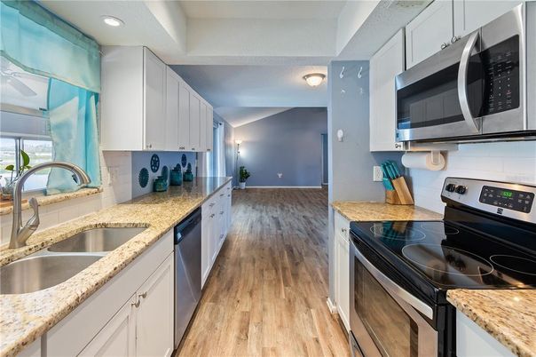 Interior, Kitchen, Recessed Lighting, Stainless Steel Appliances, Wood Texture Flooring