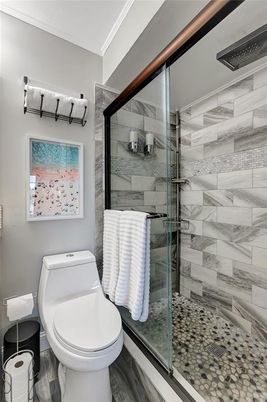 Bathroom, Glass Shower, Interior, Marble Walls, Wood Texture Flooring