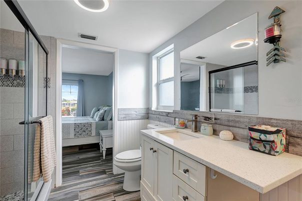 Bathroom, Bedroom, Glass Shower, Interior, Recessed Lighting, Wood Texture Flooring