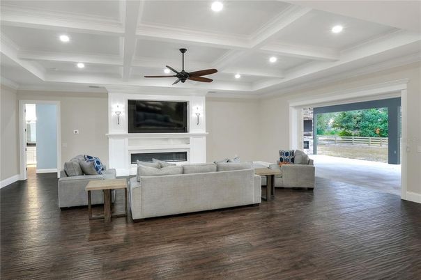 Fireplace, Interior, Living room, Recessed Lighting, Wood Texture Flooring