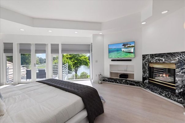 Bedroom, Fireplace, Interior, Recessed Lighting, Wood Texture Flooring