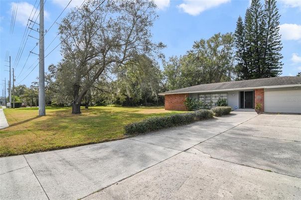Attached, Backyard, Exterior, Facade, Brick Facade, Ranch