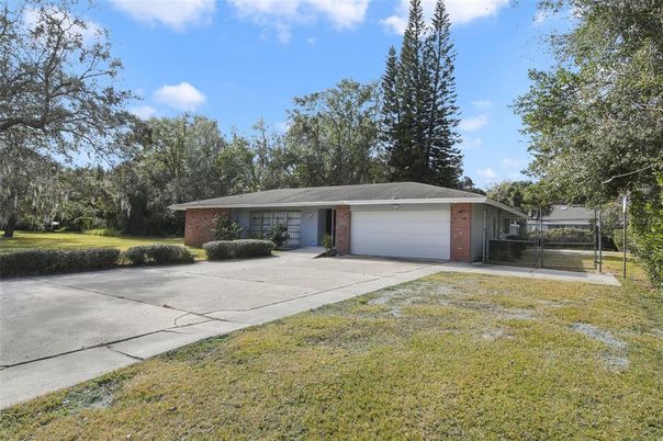 Attached, Backyard, Exterior, Facade, Brick Facade, Ranch