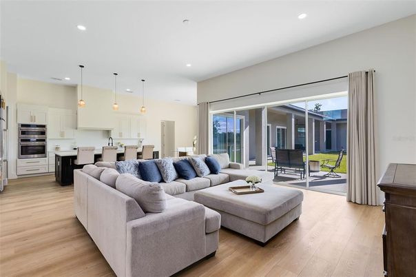 Dining room, Interior, Kitchen, Living room, Pendant Lights, Recessed Lighting, Stainless Steel Appliances, Wood Texture Flooring