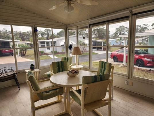 Dining room, Interior, Sun Room, Wood Texture Flooring