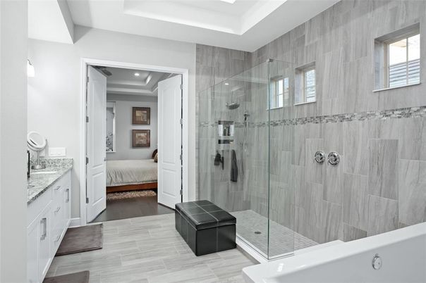 Bathroom, Dual Sink Vanities, Free Standing Baths, Glass Shower, Interior, Wood Texture Flooring
