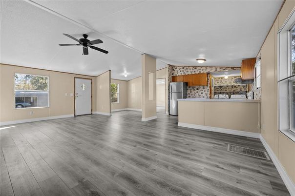 Empty room, Interior, Kitchen, Stainless Steel Appliances, Wood Texture Flooring