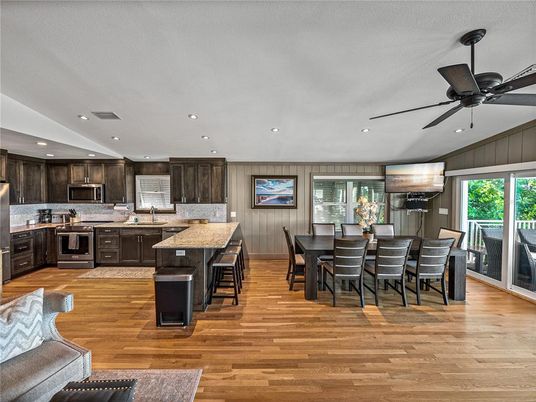 Dining room, Interior, Kitchen, Recessed Lighting, Stainless Steel Appliances, Wood Texture Flooring