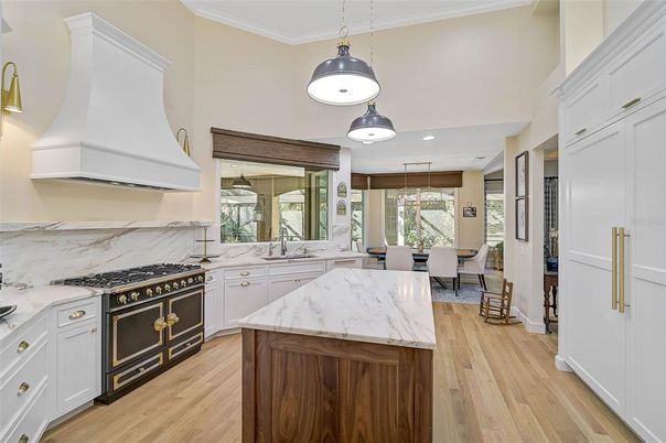 Dining room, Interior, Kitchen, Marble Walls, Pendant Lights, Recessed Lighting, Wood Texture Flooring