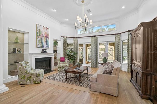 Chandelier, Fireplace, Interior, Living room, Recessed Lighting, Wood Texture Flooring