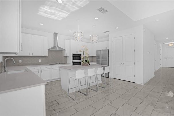 Chandelier, Interior, Kitchen, Marble, Pendant Lights, Recessed Lighting, Stainless Steel Appliances