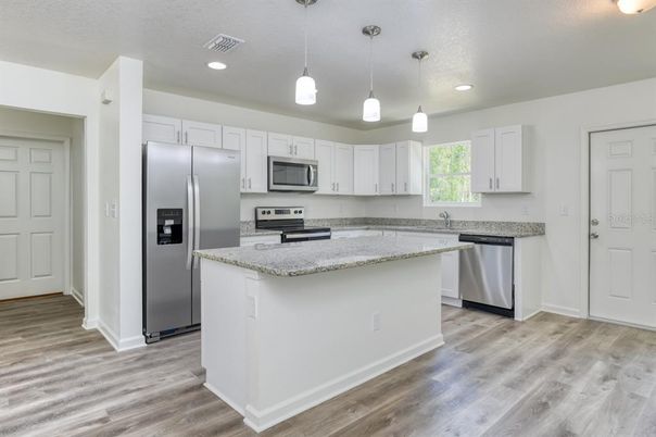 Interior, Kitchen, Pendant Lights, Recessed Lighting, Stainless Steel Appliances, Wood Texture Flooring