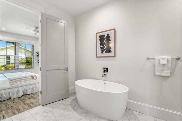 Bathroom, Bedroom, Free Standing Baths, Interior, Marble, Recessed Lighting, Wood Texture Flooring