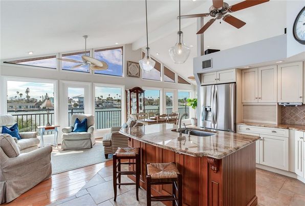 Dining room, Interior, Kitchen, Living room, Pendant Lights, Recessed Lighting, Stainless Steel Appliances, Wood Texture Flooring