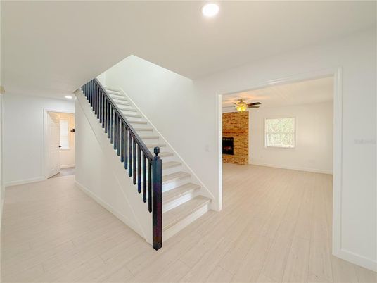 Empty room, Fireplace, Interior, Recessed Lighting, Wood Texture Flooring