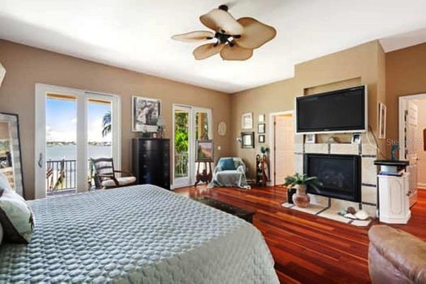 Bedroom, Fireplace, Interior, Water, Wood Texture Flooring