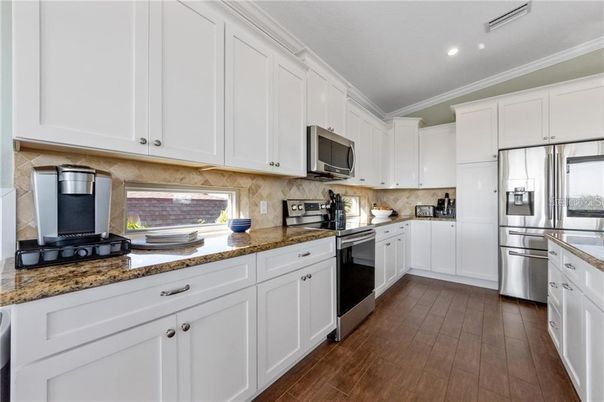 Interior, Kitchen, Recessed Lighting, Stainless Steel Appliances, Wood Texture Flooring