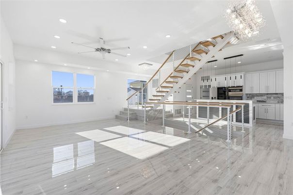 Chandelier, Interior, Kitchen, Pendant Lights, Recessed Lighting, Stainless Steel Appliances, Wood Texture Flooring