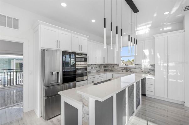 Interior, Kitchen, Pendant Lights, Recessed Lighting, Stainless Steel Appliances, Wood Texture Flooring