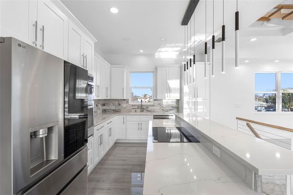 Interior, Kitchen, Pendant Lights, Recessed Lighting, Stainless Steel Appliances, Wood Texture Flooring