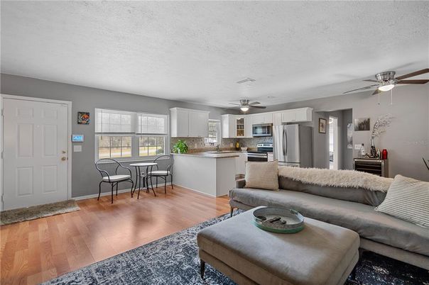 Dining room, Interior, Kitchen, Living room, Stainless Steel Appliances, Wood Texture Flooring