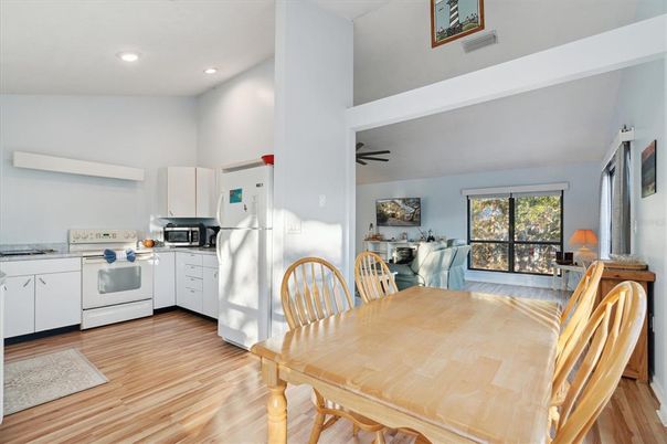 Dining room, Interior, Kitchen, Recessed Lighting, Washer, Wood Texture Flooring