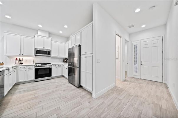 Interior, Kitchen, Recessed Lighting, Stainless Steel Appliances, Wood Texture Flooring