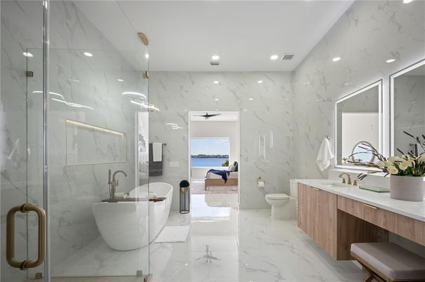 Bathroom, Dual Sink Vanities, Free Standing Baths, Glass Shower, Interior, Marble, Marble Walls, Recessed Lighting