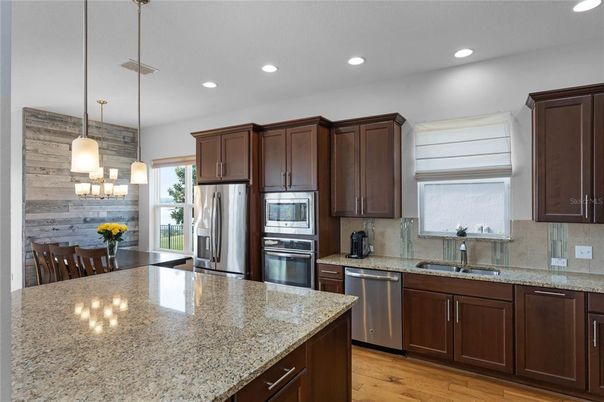 Interior, Kitchen, Pendant Lights, Recessed Lighting, Stainless Steel Appliances, Wood Texture Flooring