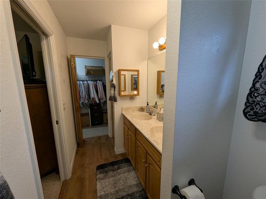 Bathroom, Dual Sink Vanities, Interior, Walk-in Closets, Wood Texture Flooring