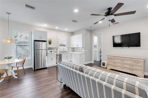 Dining room, Interior, Kitchen, Pendant Lights, Recessed Lighting, Stainless Steel Appliances, Wood Texture Flooring