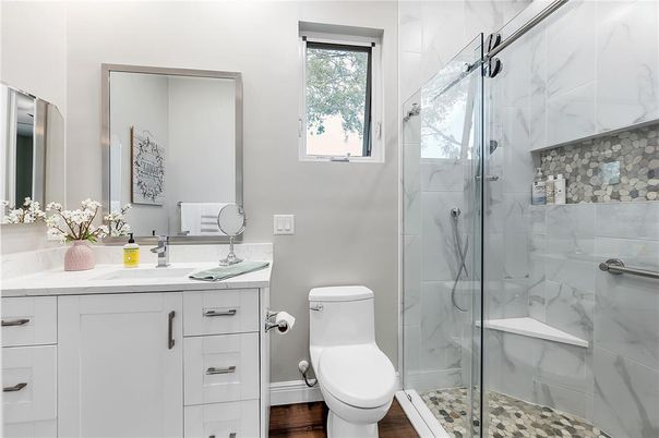 Bathroom, Glass Shower, Interior, Marble Walls, Wood Texture Flooring