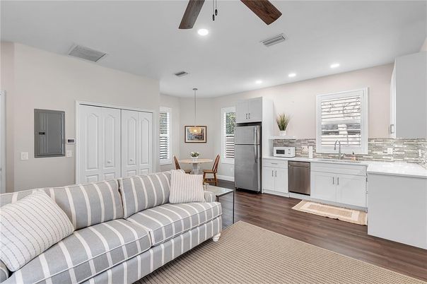 Dining room, Interior, Kitchen, Living room, Pendant Lights, Recessed Lighting, Stainless Steel Appliances, Wood Texture Flooring