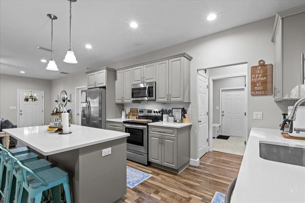 Interior, Kitchen, Pendant Lights, Recessed Lighting, Stainless Steel Appliances, Wood Texture Flooring