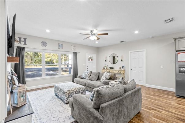 Fireplace, Interior, Living room, Recessed Lighting, Wood Texture Flooring