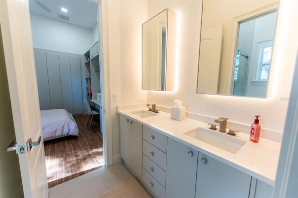 Bathroom, Dual Sink Vanities, Interior, Recessed Lighting, Wood Texture Flooring