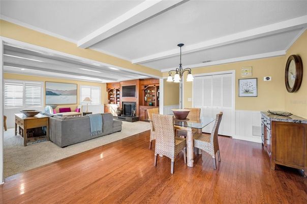 Chandelier, Dining room, Fireplace, Interior, Living room, Pendant Lights, Wood Texture Flooring