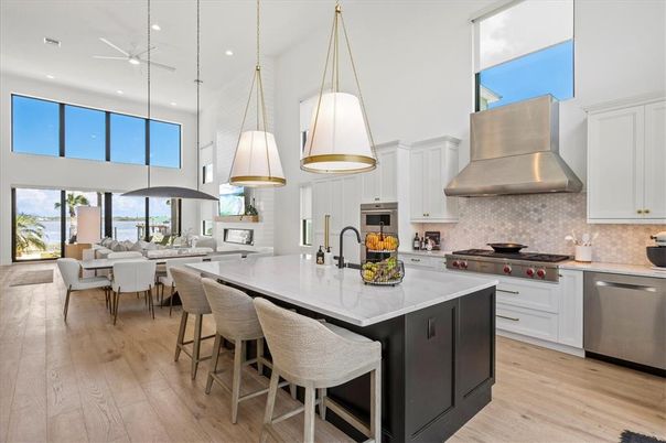 Dining room, Interior, Kitchen, Living room, Pendant Lights, Recessed Lighting, Stainless Steel Appliances, Wood Texture Flooring