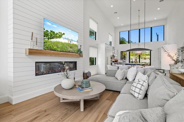 Dining room, Fireplace, Interior, Living room, Pendant Lights, Recessed Lighting, Wood Texture Flooring