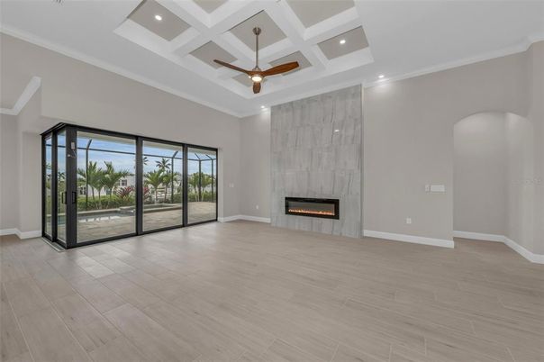 Empty room, Fireplace, Interior, Recessed Lighting, Wood Texture Flooring