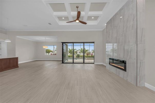 Empty room, Fireplace, Interior, Pendant Lights, Recessed Lighting, Wood Texture Flooring