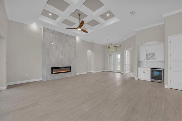 Empty room, Fireplace, Interior, Pendant Lights, Recessed Lighting, Wood Texture Flooring