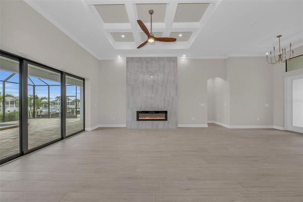 Empty room, Fireplace, Interior, Pendant Lights, Recessed Lighting, Wood Texture Flooring